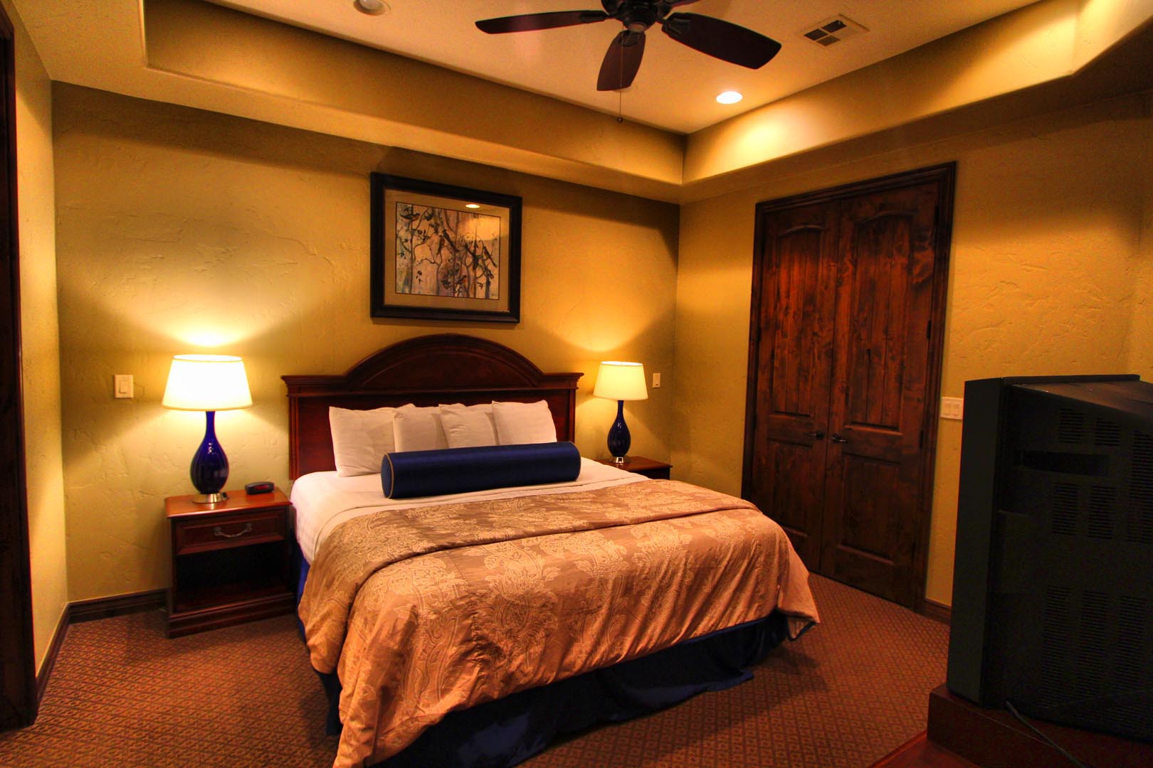 A spacious master bedroom at VRI's Canyon Villas at Coral Ridge in Washington, Utah.